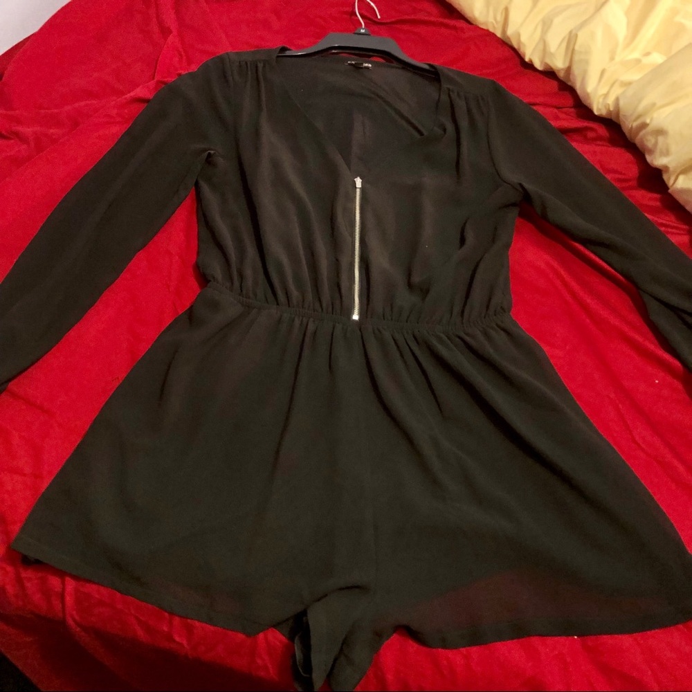 Black long sleeve zip up romper by Express M